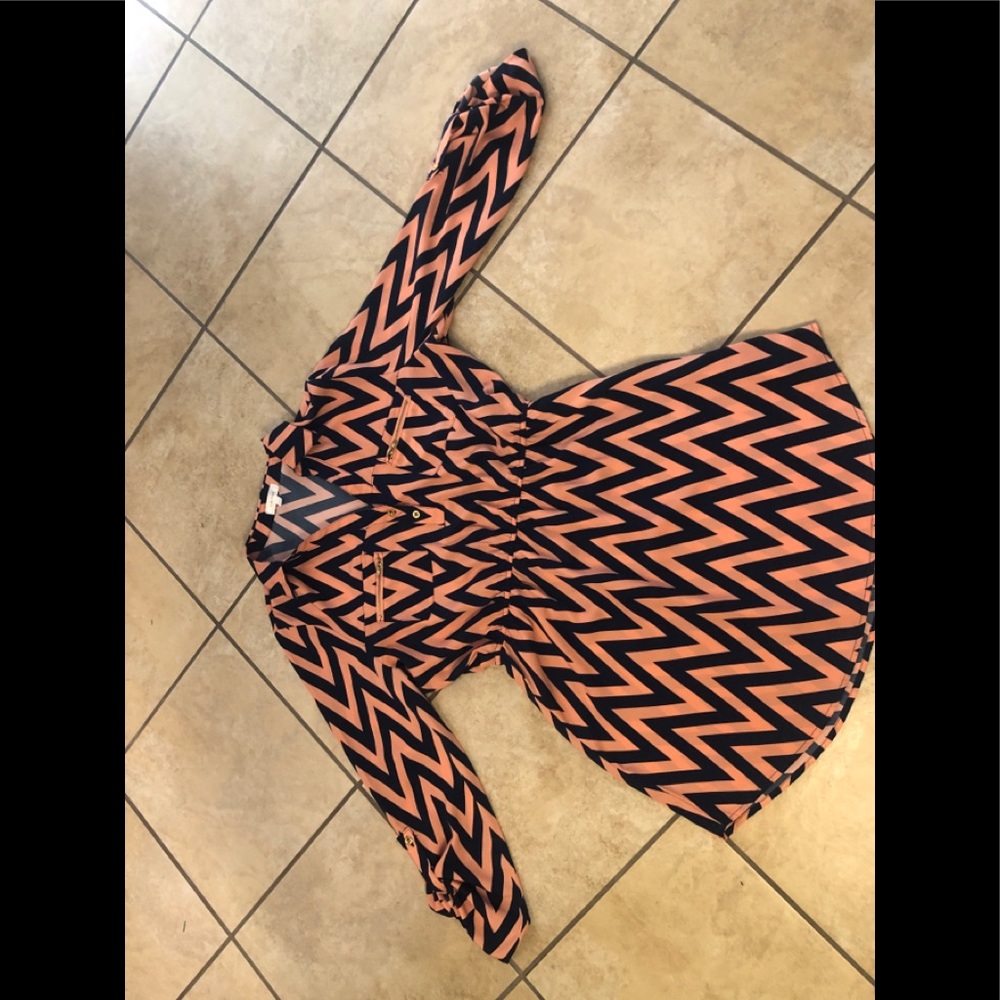 A long sleeve Stella Tweed dress.
